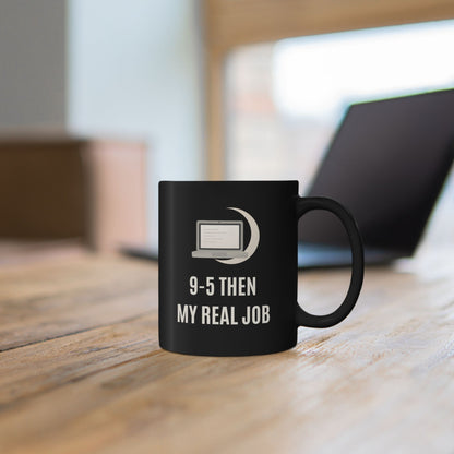 “9–5 THEN MY REAL JOB” Mug (Black)